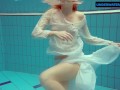Redhead Diana hot and horny in a white dress