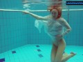 Redhead Diana hot and horny in a white dress