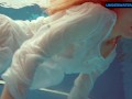 Redhead Diana hot and horny in a white dress
