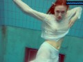 Redhead Diana hot and horny in a white dress