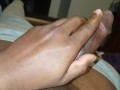 Putting cocoa butter on elephant trunk.