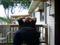 Fat men sitting outside happy