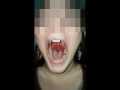 Girl huge mouth and long tongue spit