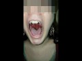 Girl huge mouth and long tongue spit