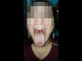 Girl huge mouth and long tongue spit