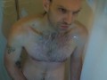 A big dick romantic mature male in the shower.