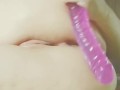 Masturbation beautiful pussy with a silicone dildo close up