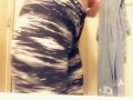 Teen with paint on her face strips for snap