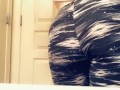 Teen with paint on her face strips for snap