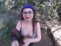 cute teen girl undressing in forest