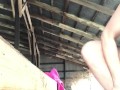 Naughty girl masturbates in barn