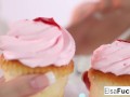 Elsa and Daisy play with some cupcakes and each other