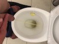 Pissing in toilet
