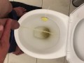 Pissing in toilet