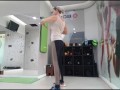 Cute blonde doing her warmup at the gym