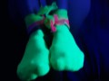 Glow in the dark blowjob and sockjob with hands and feet tied up