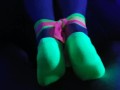 Glow in the dark blowjob and sockjob with hands and feet tied up