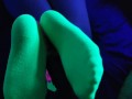 Glow in the dark blowjob and sockjob with hands and feet tied up