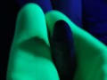 Glow in the dark blowjob and sockjob with hands and feet tied up