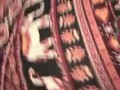 Booty jiggle in those pattern leggings close up