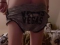 Petite teen strips down