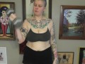 CHUBBY TATTOOED GIRL DOING BICEP CURLS