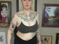 CHUBBY TATTOOED GIRL DOING BICEP CURLS