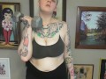 CHUBBY TATTOOED GIRL DOING BICEP CURLS