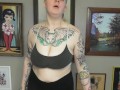 CHUBBY TATTOOED GIRL DOING BICEP CURLS