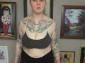 CHUBBY TATTOOED GIRL DOING BICEP CURLS