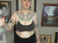 CHUBBY TATTOOED GIRL DOING BICEP CURLS