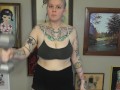 CHUBBY TATTOOED GIRL DOING BICEP CURLS