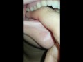 girl biting hard finger