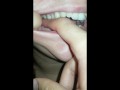 girl biting hard finger