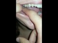 girl biting hard finger