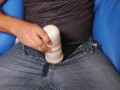 Solo masturbating using fleshlight with cumshot