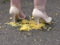 Crush-fetish. Thick legs in heels crushed the corn mercilessly.