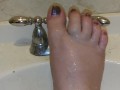 Foot washing in sink