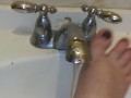 Foot washing in sink