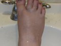 Foot washing in sink