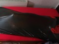 Rubberdoll get in Vacbed with gloves