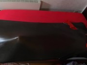 Rubberdoll get in Vacbed with gloves