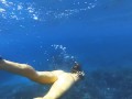 Public beach. Nude snorkeling / Underwater. Save the ocean and have fun!