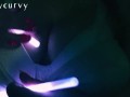 Carlycurvy plays with glow sticks while rubbing big boobs and clit down 