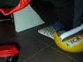 Male shoeplay and stomping stuff at home in Nikes, Vans, blue stiped socks