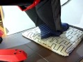 Male shoeplay and stomping stuff at home in Nikes, Vans, blue stiped socks
