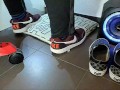 Male shoeplay and stomping stuff at home in Nikes, Vans, blue stiped socks