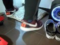 Male shoeplay and stomping stuff at home in Nikes, Vans, blue stiped socks