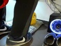 Male shoeplay and stomping stuff at home in Nikes, Vans, blue stiped socks
