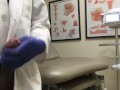 Doctor Relieving Stress In Hospital Exam Room